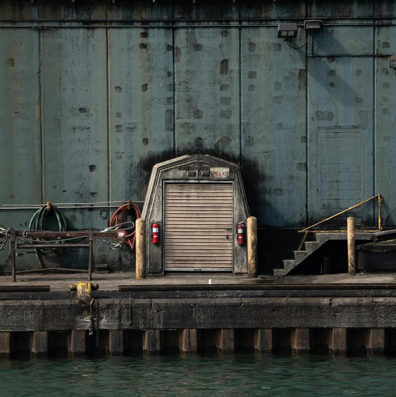 Metal Wall and a Concrete Pier